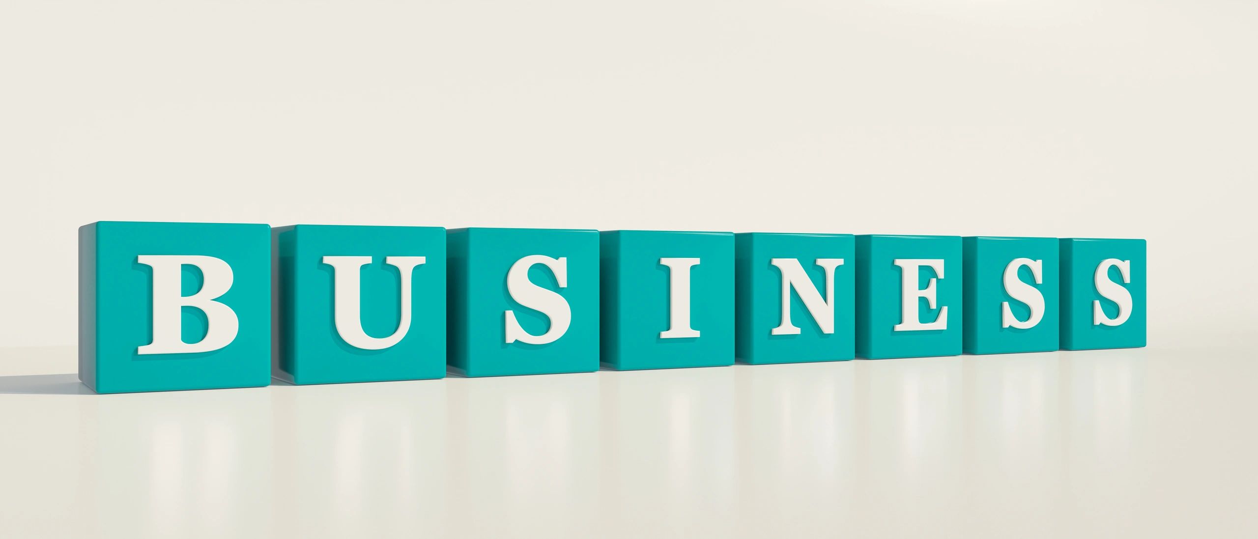 Business. Blue dices with white letters and the